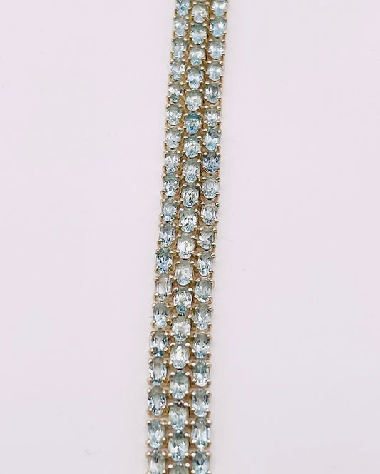 Three row blue topaz tennis bracelet