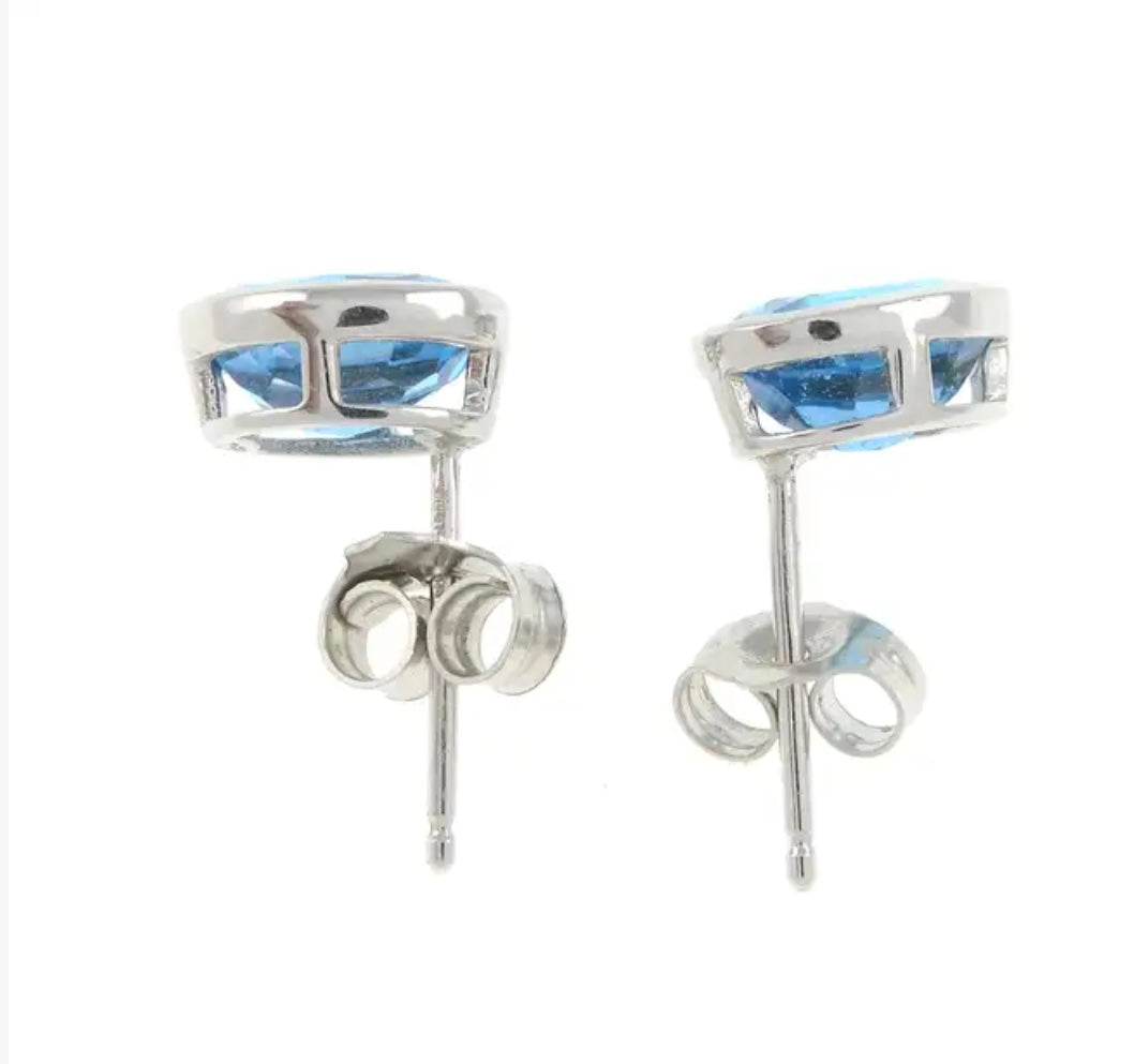Blue topaz stud earrings set in 18ct gold