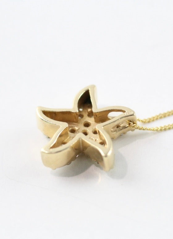 Starfish diamond pendant on 14ct gold chain
