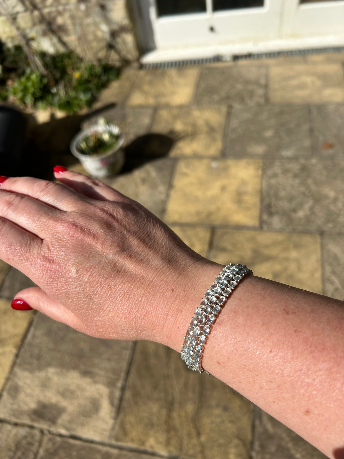 Three row blue topaz tennis bracelet