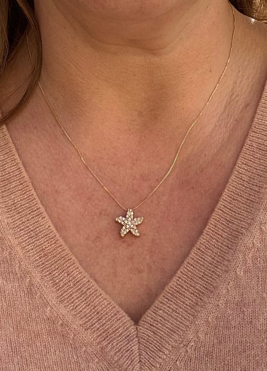 Starfish diamond pendant on 14ct gold chain