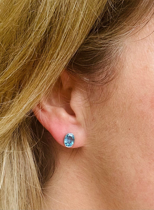 Blue topaz stud earrings set in 18ct gold