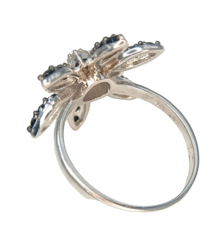 Black onyx and white spinel starburst ring