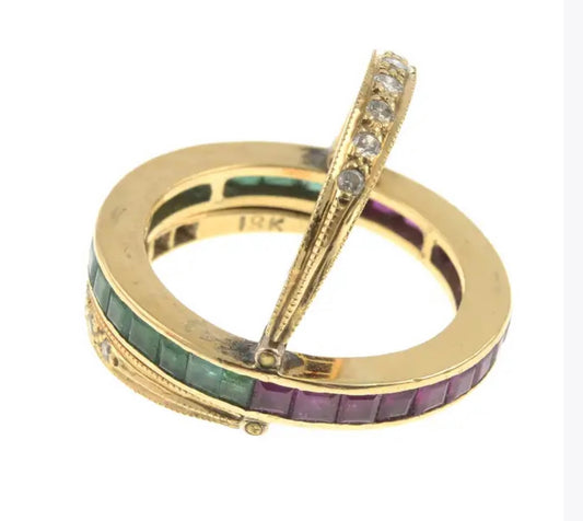 Diamond, ruby & emerald swivel eternity ring set in 18k yellow gold
