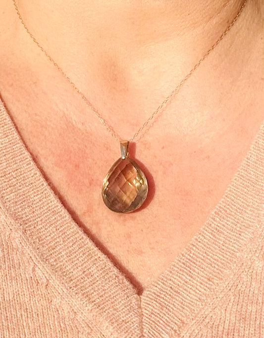 Smoky quartz pendant on a gold chain