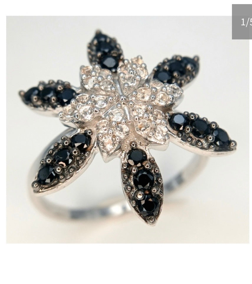 Black onyx and white spinel starburst ring