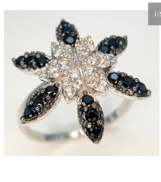 Black onyx and white spinel starburst ring