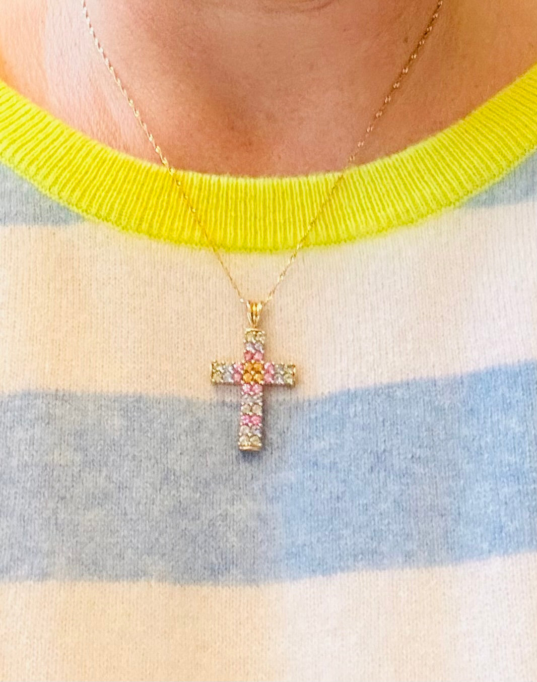 Multi coloured sapphire cross on gold chain