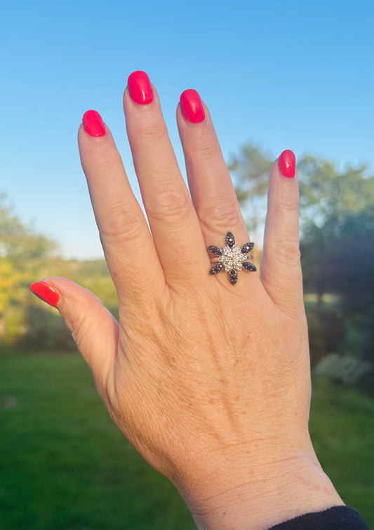 Black onyx and white spinel starburst ring