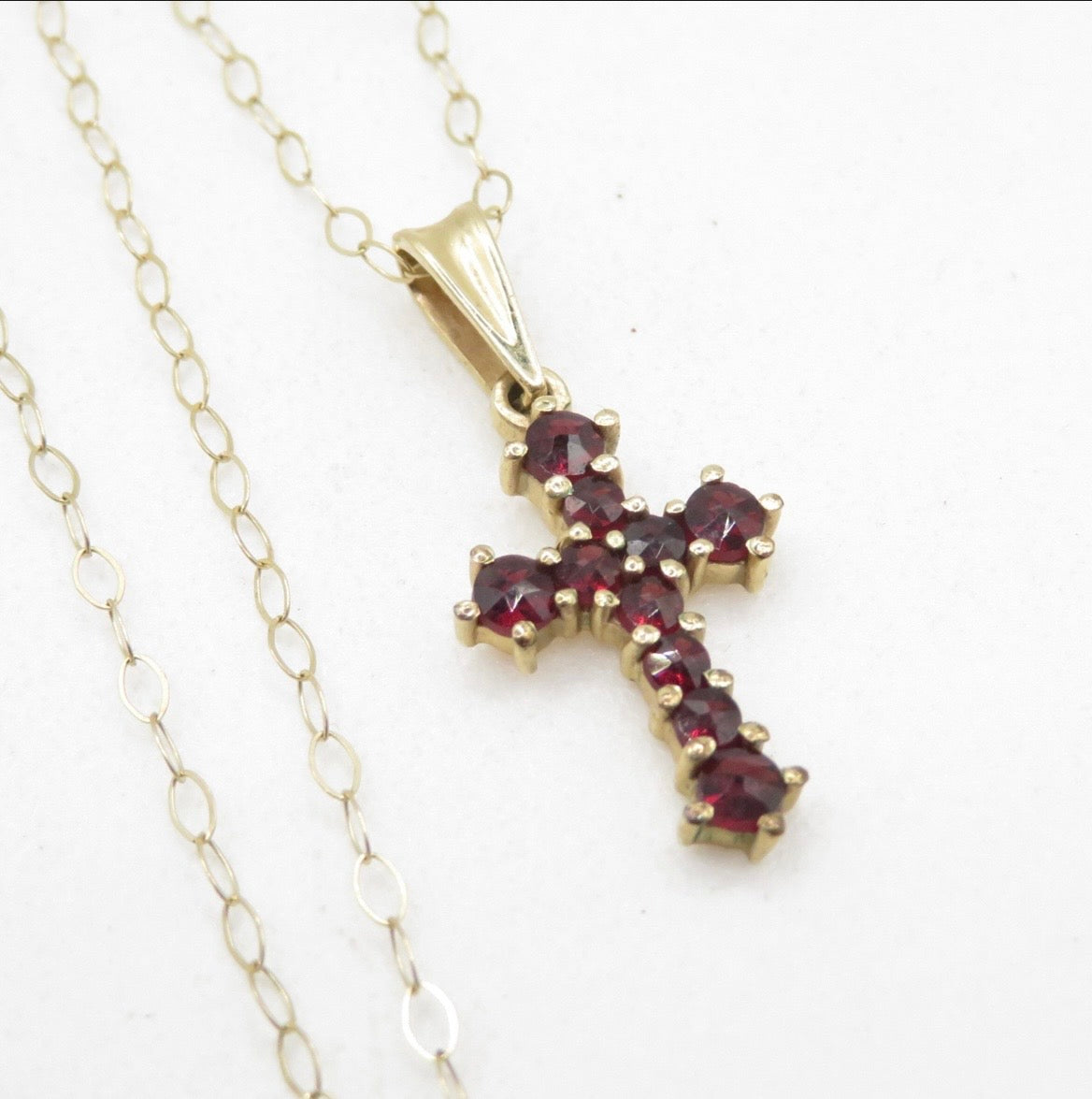 Garnet cross pendant