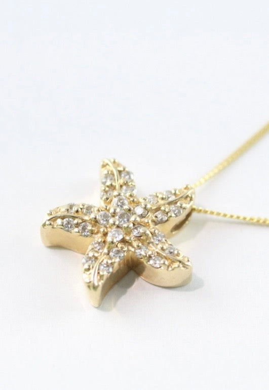 Starfish diamond pendant on 14ct gold chain