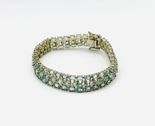 Three row blue topaz tennis bracelet