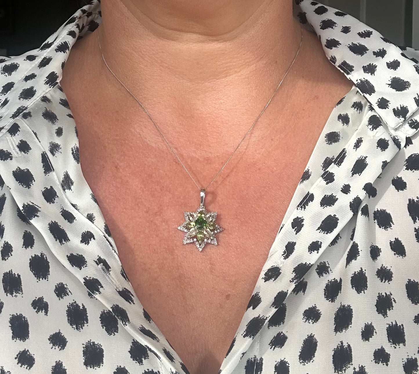 Diamond, peridot & diopside star pendant on a white gold chain