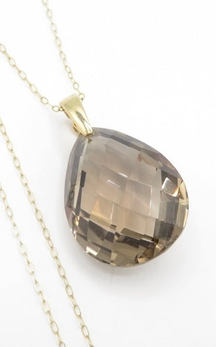 Smoky quartz pendant on a gold chain