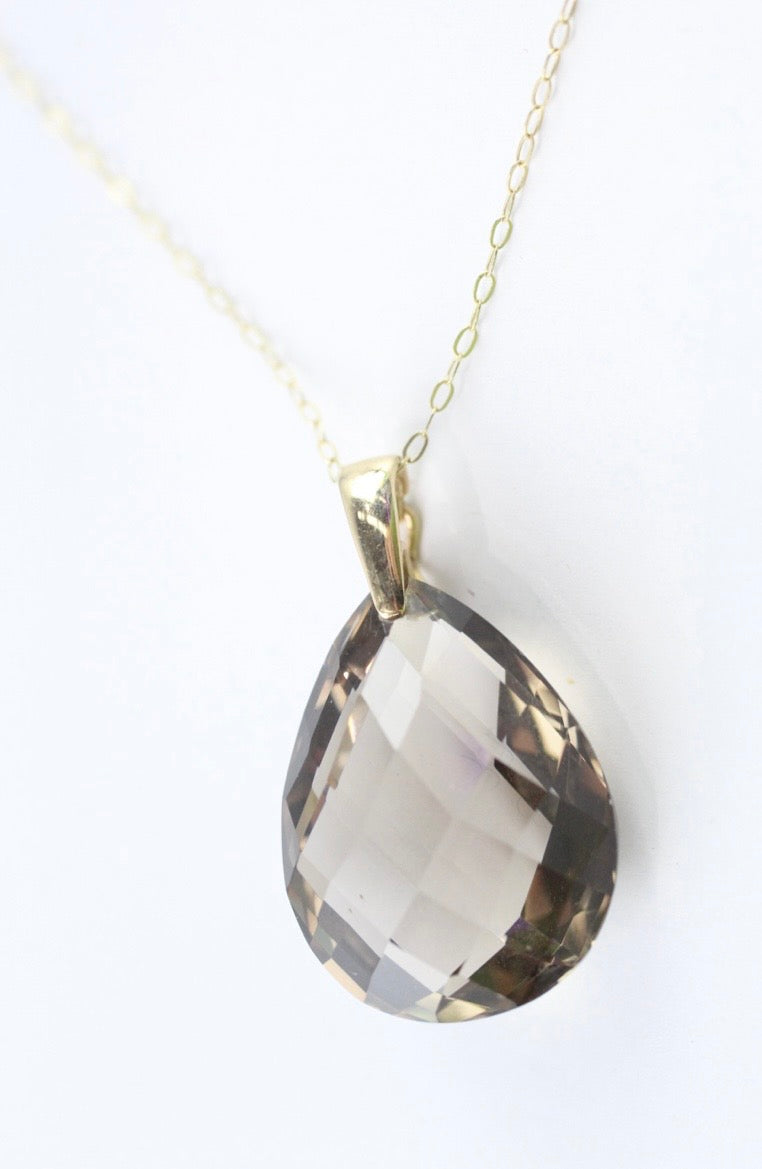 Smoky quartz pendant on a gold chain